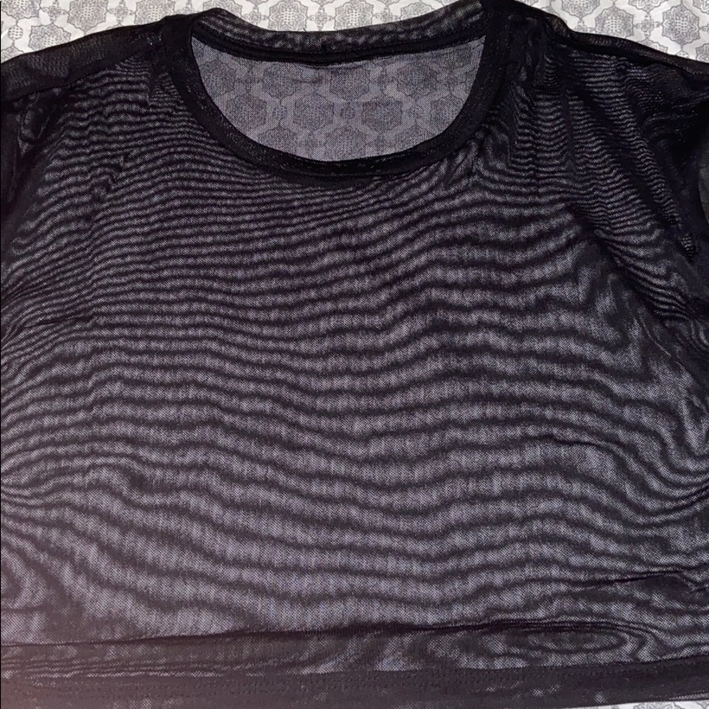 Black see through shirt.